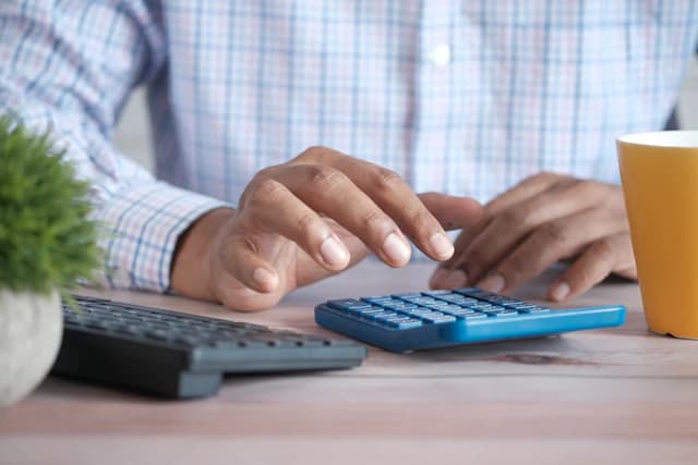 Freight cost calculations being reviewed at a business desk